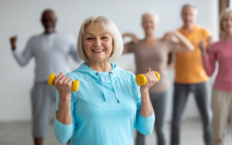 multiracial group of seniors engaging in indoor exercises