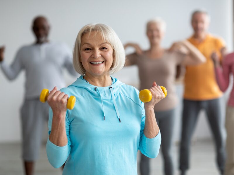 multiracial group of seniors engaging in indoor exercises